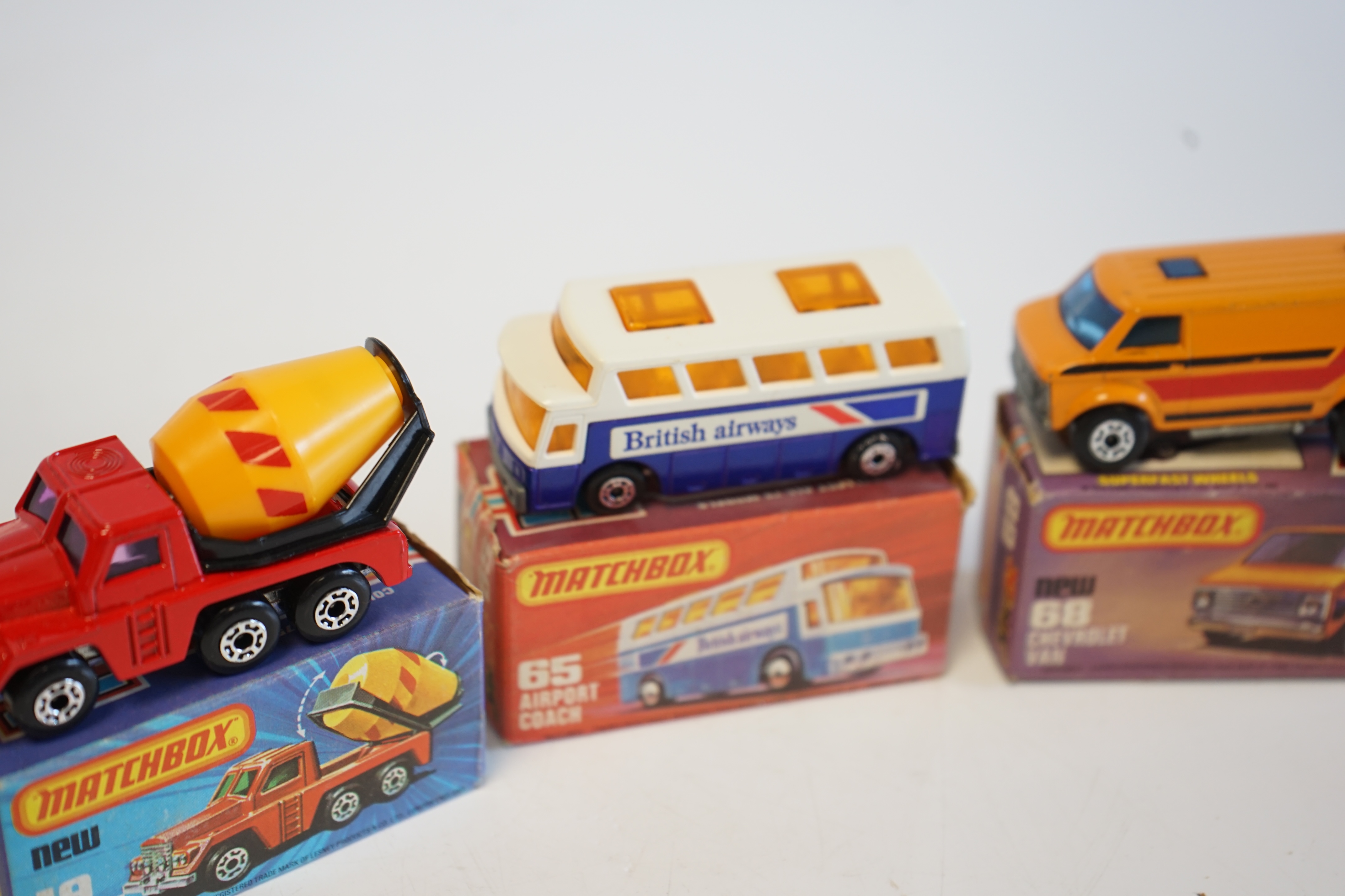 Sixteen boxed Matchbox Series 1-75 diecast vehicles including; 14; Petrol Tanker and another, 19; Cement Truck, 28; Formula Racing Car and another, 35; Zoo Truck, 36; Refuse Truck, 46; Mercedes 300 SE coupe, 63; Freeway